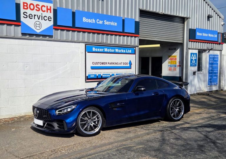 Boxer Motor Works Ltd Bosch Garage with a dark blue BMW outside